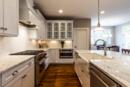 Kitchen with Marble Counter tops by REICO
