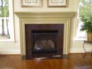 Fireplace with Decorative Tile Surround in Estates of Grey Oaks